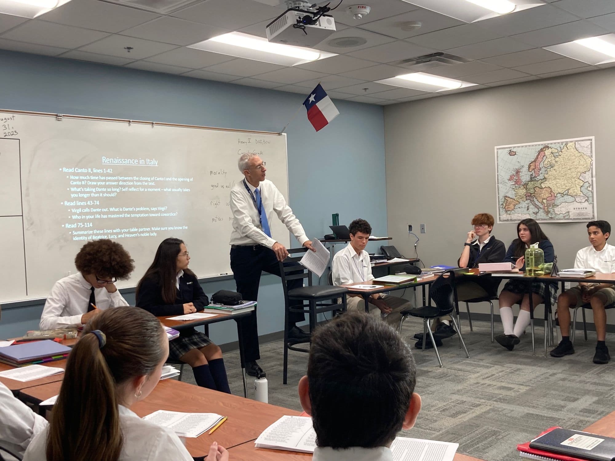 Humane Letters seminar — teacher with upper-school students discussing the Renaissance